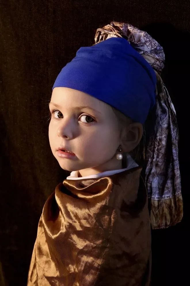 她把孩子拍成了世界名画！