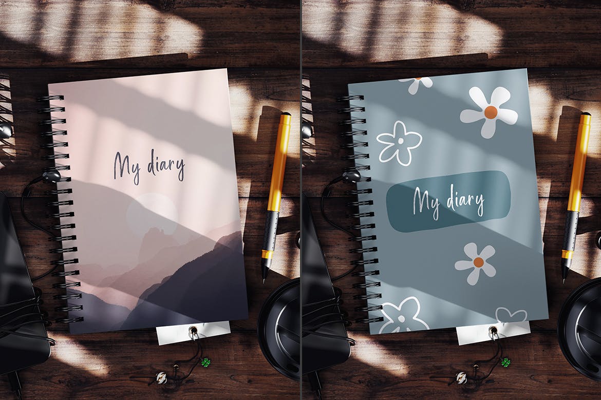 真实光影效果螺旋笔记本PSD样机素材